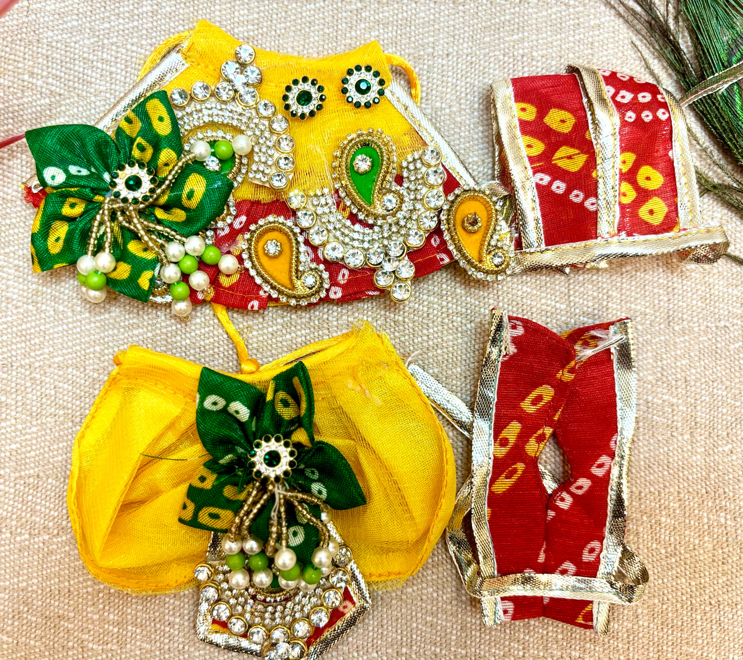 Laxmi ji & Ganesh ji Set Yellow & Red Bandhej Lehenga & Dhoti - 7 piece set