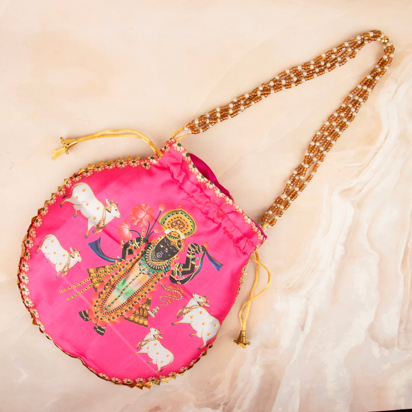 Pink Premium Cow Shreenath Ji Potli with Pearl Handle