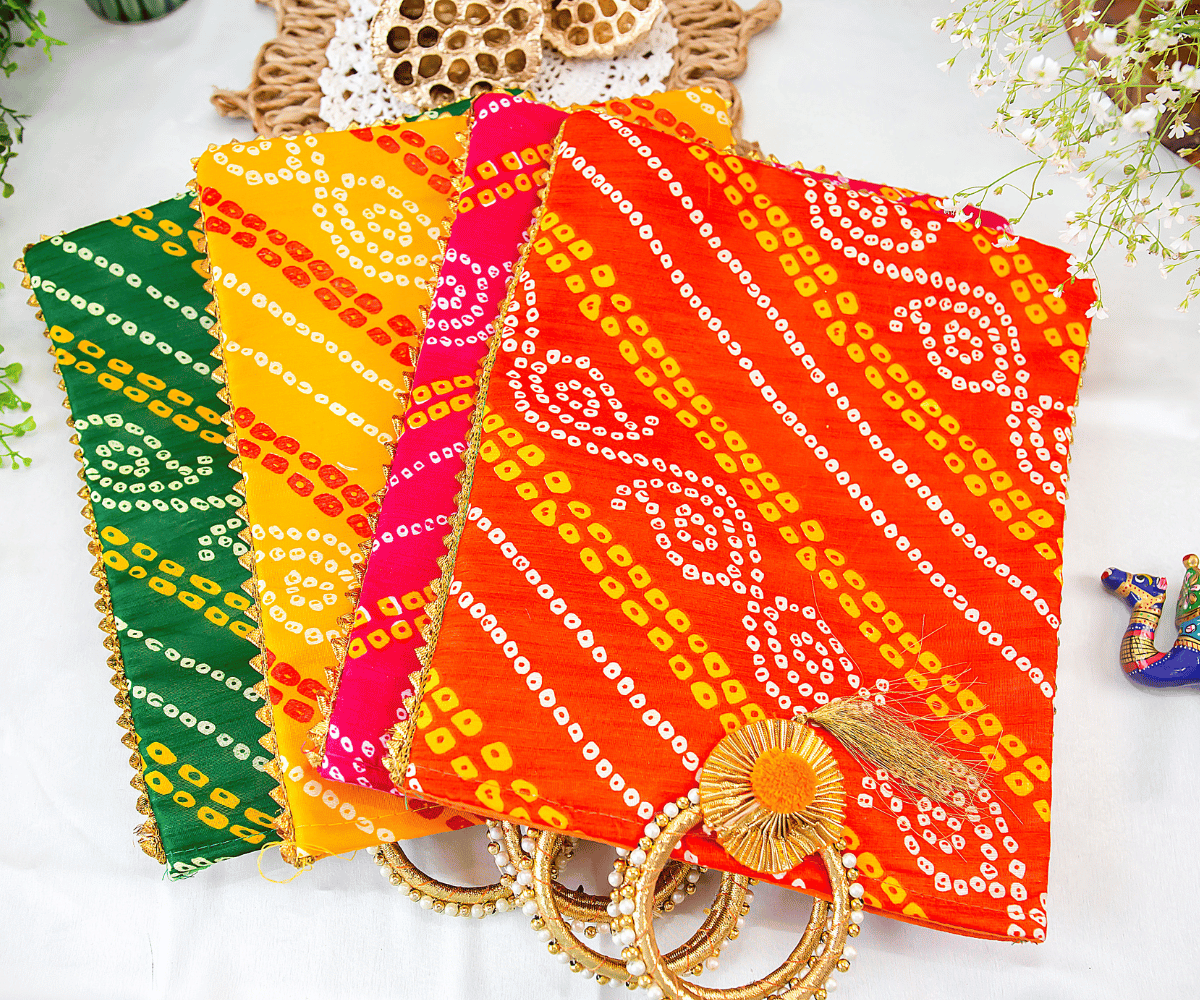 Orange Bandhej Hand Bags