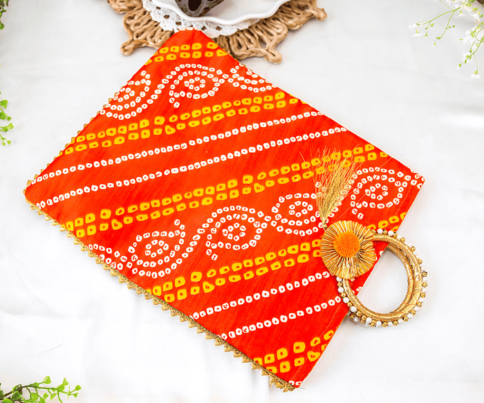 Orange Bandhej Hand Bags